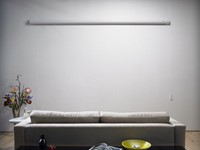 Een ingerold Electro L-Series projectiescherm ||